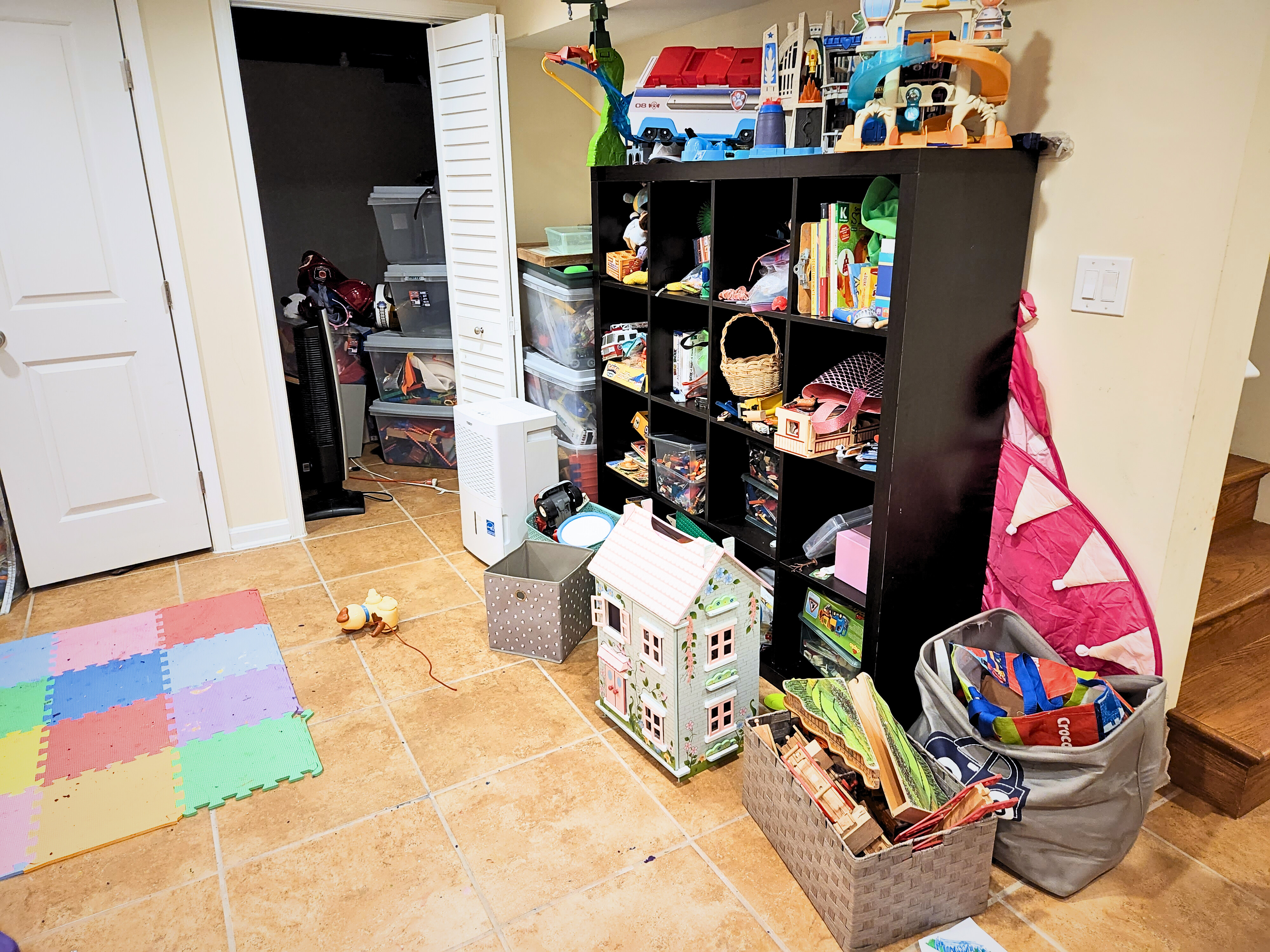 Playroom Den before professional organizing